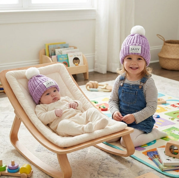 sisters wearing matching lilac jaxy beanies (1)
