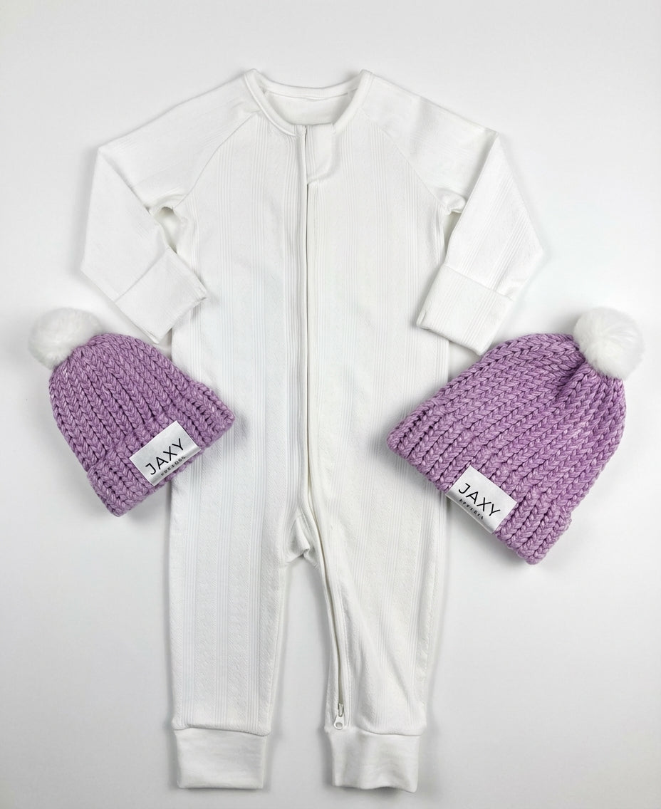 white onesie with lilac jaxy beanies 
